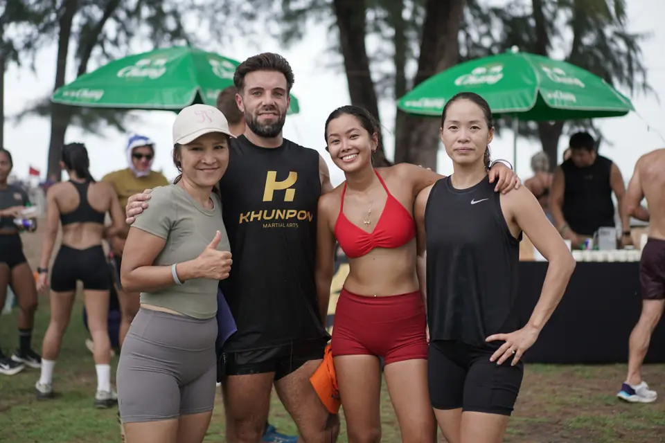 A Khunpon coach with three competitors after the event