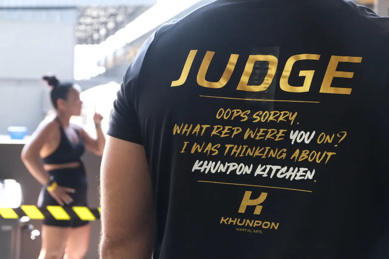 The back of a judge's shirt reads: Judge. Oops sorry, what rep were you on? I was thinking about Khunpon Kitchen