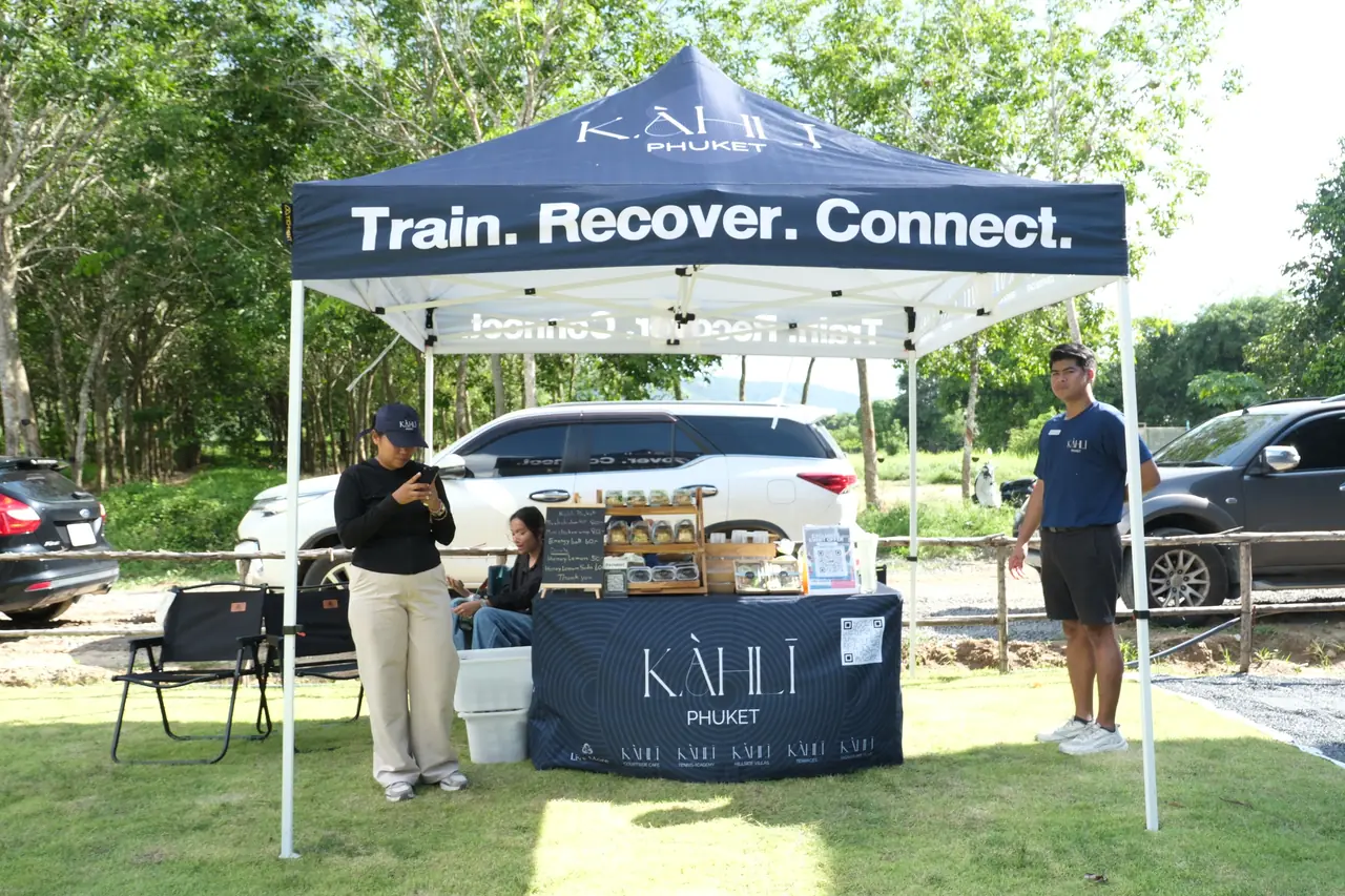 The KAHLI Phuket tent on the lawn, with the words Train. Recover. Connect.