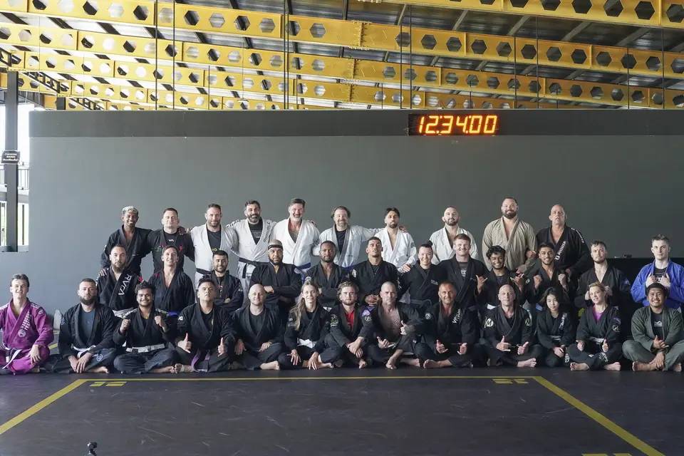 The whole group seated for the wide group photo