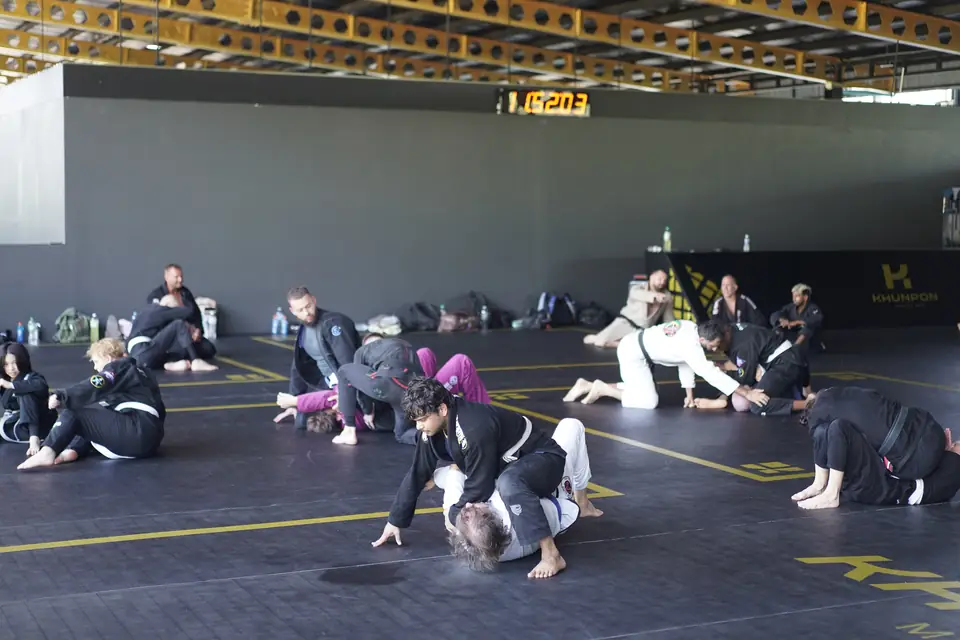 A wide view of the mats with pairs drilling under the roof