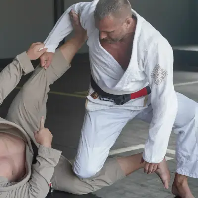 Guard drill in the gi at Khunpon